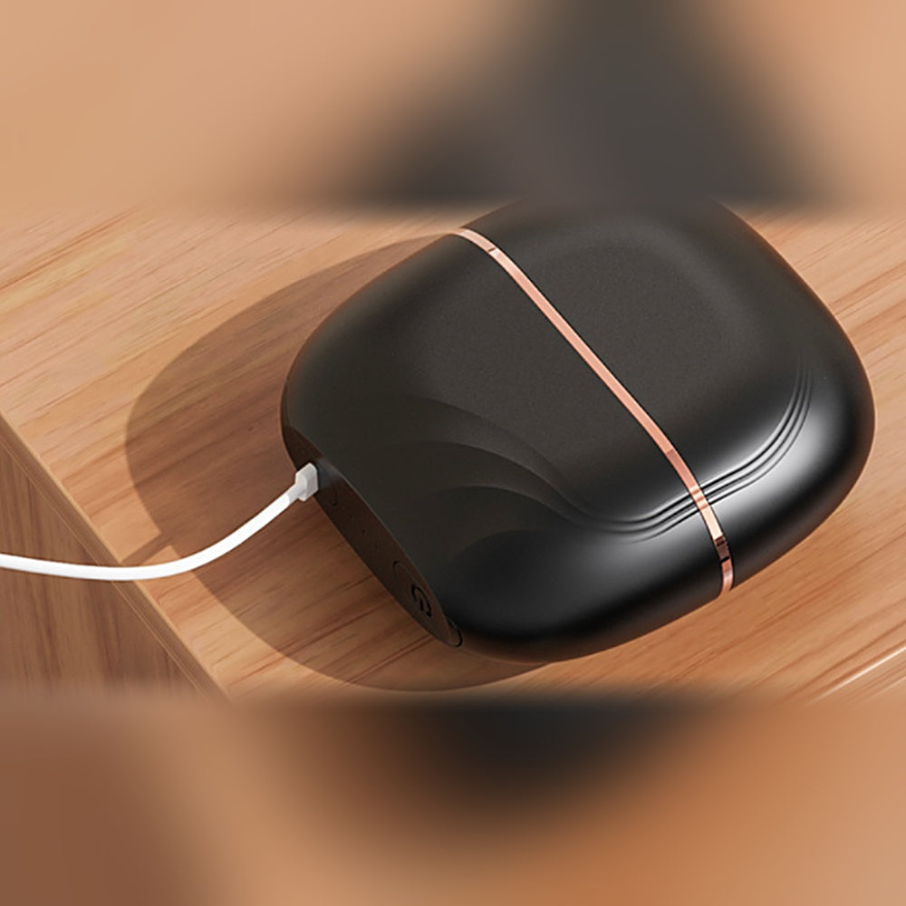 Brosse lissante sans fil OREVANYS en recharge USB-C